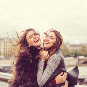 Happy girls enjoying Paris together