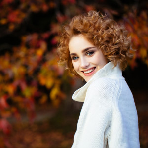 Autumn photo of a beautiful girl