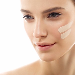 perfect-makeup-skin-tone-cream-lines-on-woman-face-picture-id624712276