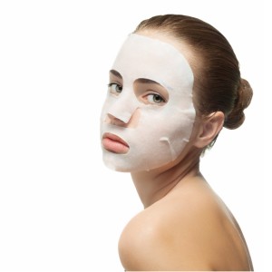 young-woman-with-beauty-mask-on-her-face-picture-id534824285 (1)